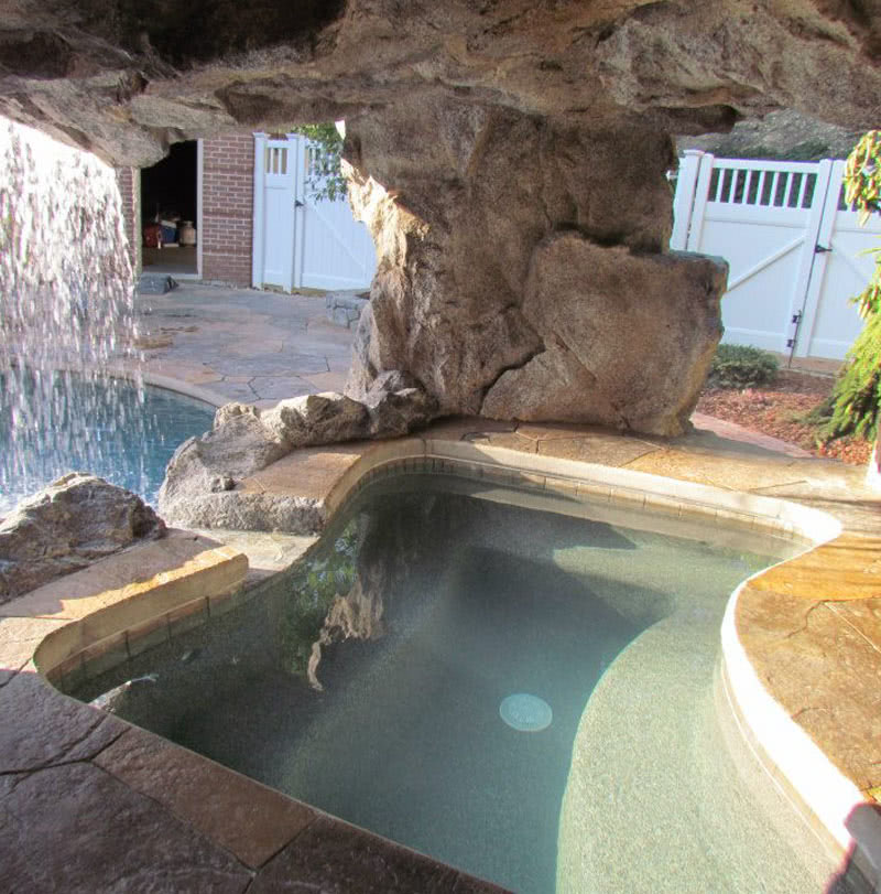 poolside grotto with spa for in-ground pool